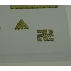 Small spheres forming a triangle and swastika